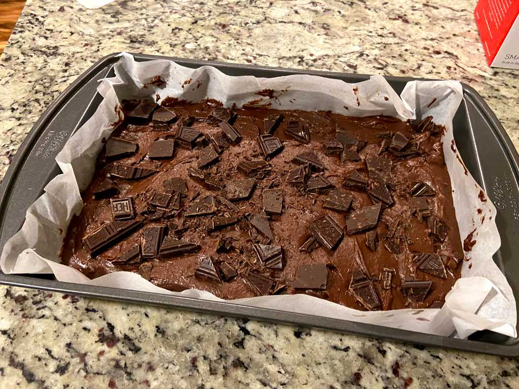Brownie batter in a pan