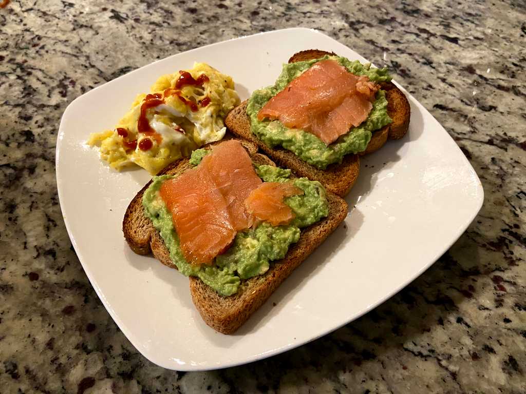 Salmon avocado toast with scrambled eggs