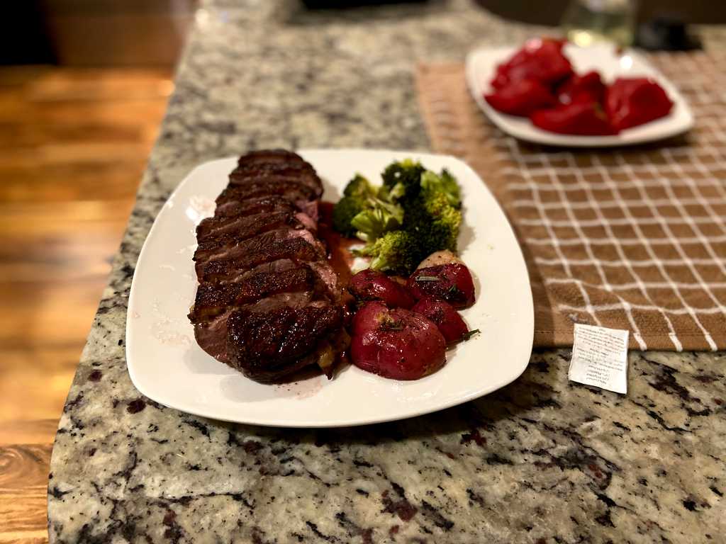Duck, broccoli, and potatoes